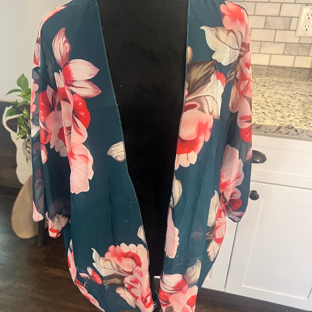 Blue and Pink Cape with Flowing Design